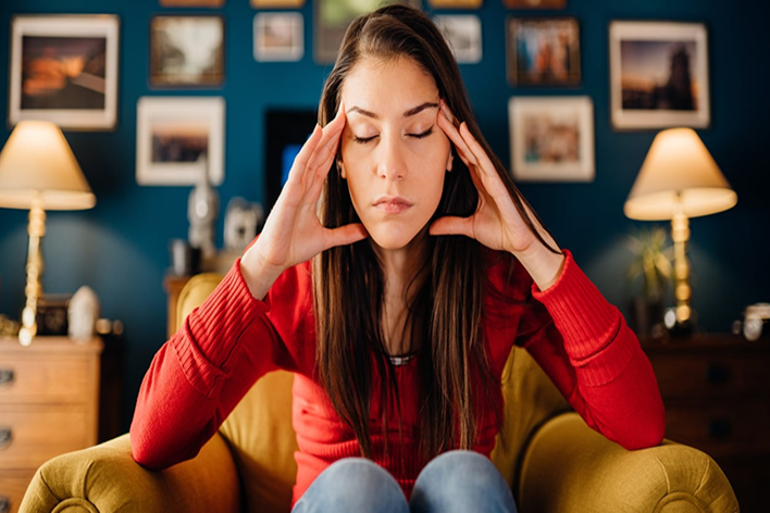 Woman stressed from overthinking Mirchi Bomb